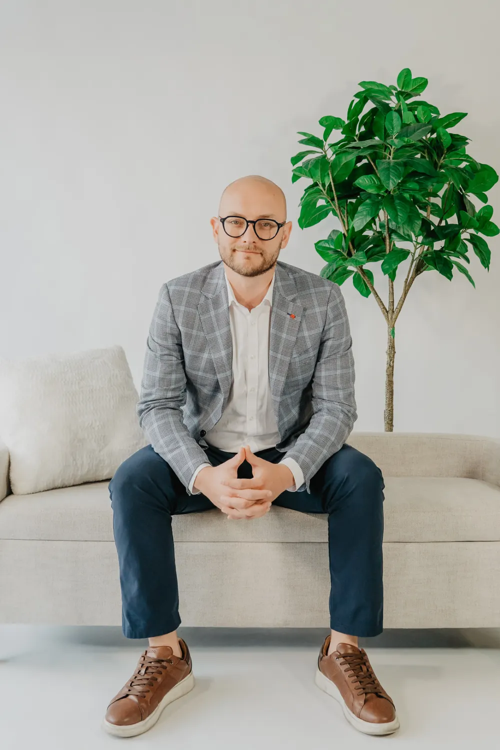Dave Verkh seated during a client conversation